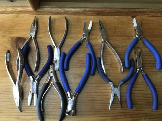 Assorted Pliers ,screwdrivers and burring tool