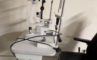 CSO slit lamp with electric desk