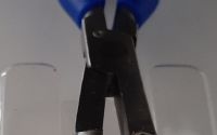 New lens block remover plier