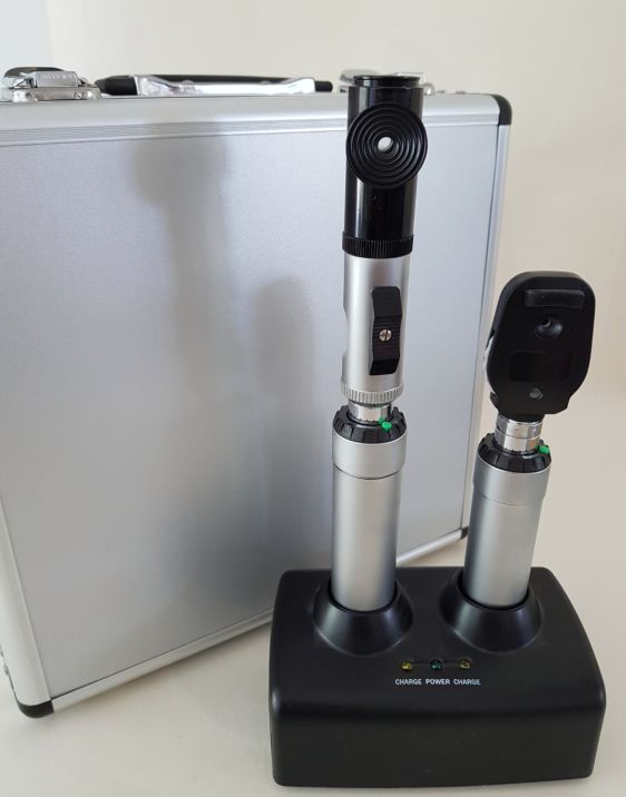 New Ophthalmoscope and Retinoscope in case Used Ophthalmoscopes