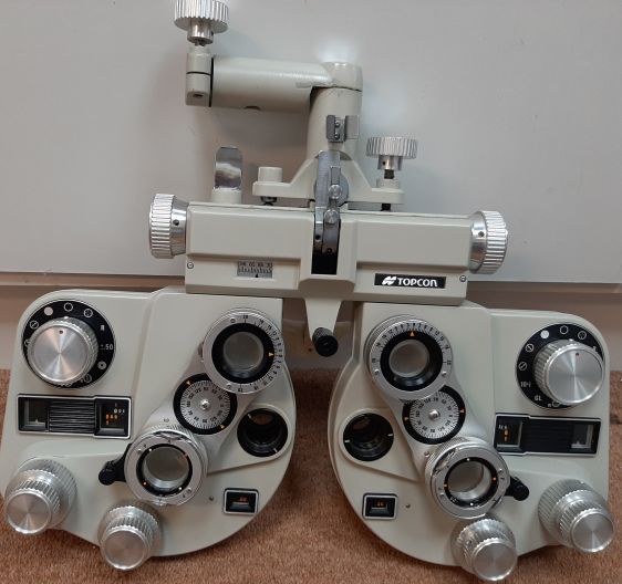 Topcon refractor head with wall mount arm