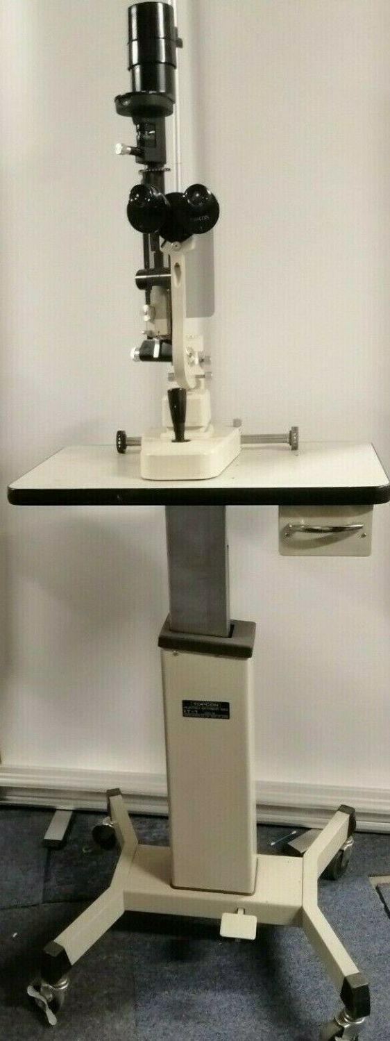 Topcon SL-3C slit lamp with a table