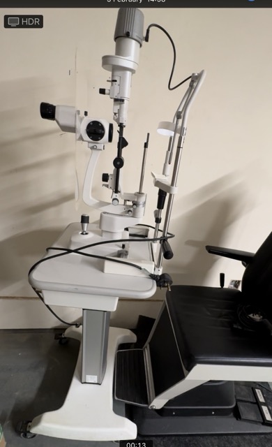 CSO slit lamp with electric desk