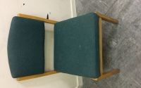 Wooden frame green padded chairs