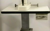 Topcon SL-3C slit lamp with a table