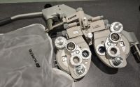 Topcon phoropter head with phoropter arm